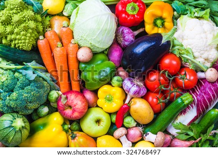 Assorted raw vegetables and fruits.