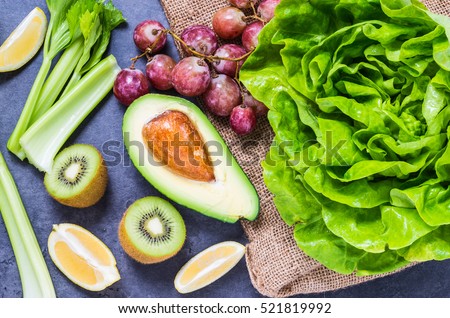 Vegetables and fruits detox ingredients for green smoothie top view.
