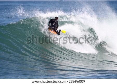 body board riding a wave