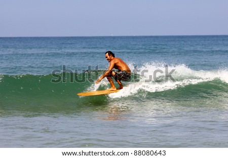 surfer riding the wave