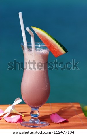 Smoothies drink for healthy Healthy drink with a background sea.
