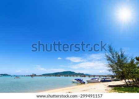 Beach harbor area for tourist traveling to the sea under the sun of summer at Ao Chalong Bay famous attractions in Phuket island, Thailand