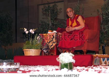 BARCELONA, SPAIN - SEPTEMBER 10: XIV Dalai Lama Tenzin Gyatso speaks in a conference on September 10, 2007 in Barcelona, Catalonia, Spain