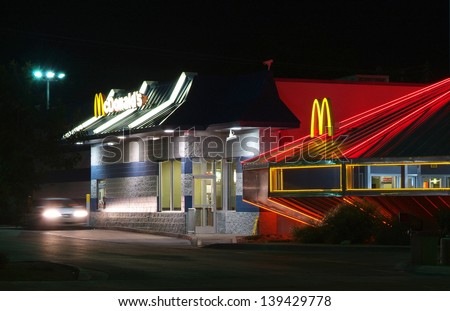 ROSWELL, NEW MEXICO - OCT 14: McDonald's Restaurant in Roswell, New Mexico as seen at night on October 14, 2008. The only UFO shaped McDonalds in the world.