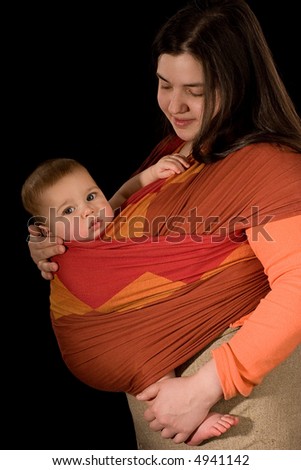 Baby in sling on mother hand