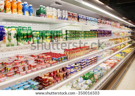 Chernihiv / Ukraine - 04 September 2015: yoghurt and others dairy produce on the shelves of shop in supermarket of Chernihiv.  04 September 2015 in Chernihiv / Ukraine.