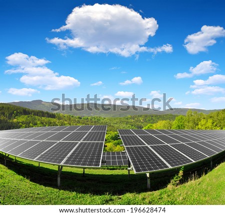 Solar energy panels in spring landscape