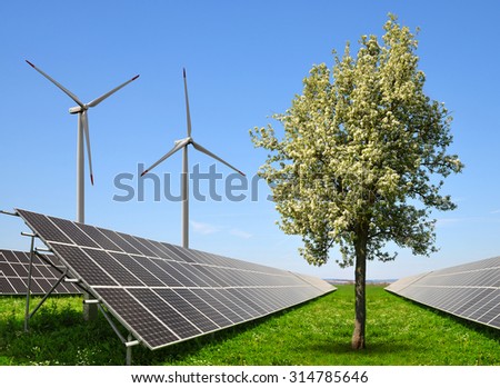 Solar energy panels with wind turbines. The concept of clean energy.