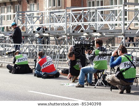 COPENHAGEN - SEPTEMBER 19: Press photographers covers the 2011 UCI time trial road championships in Copenhagen. September 19, 2011 in Copenhagen and Rudersdal, Denmark.