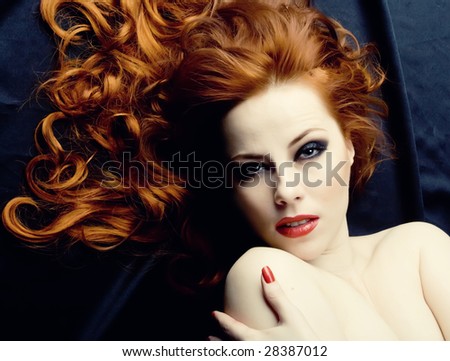 stock photo : Beauutiful young woman with red hair