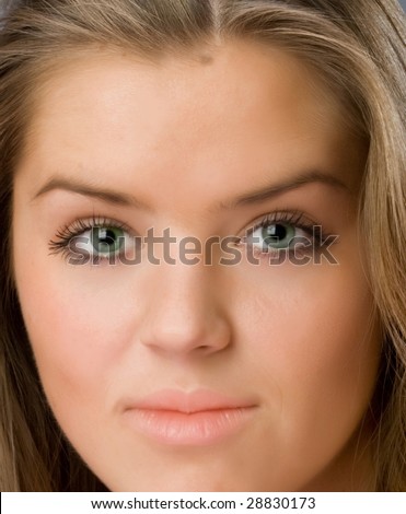 Beautiful fresh face of young girl close-up