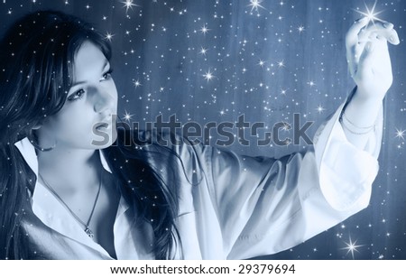 Beautiful young woman in moonlight