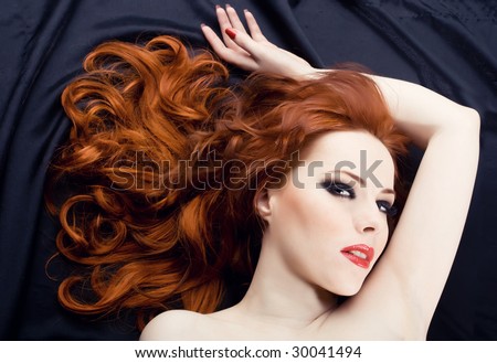 stock-photo-beautiful-sexy-woman-with-red-hair-30041494.jpg