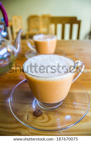 two cups of hot milk tea