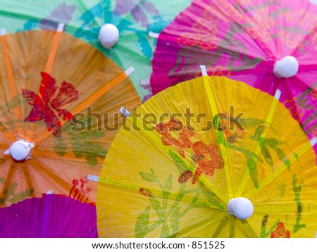 A closeup shot of some colourful cocktail umbrellas