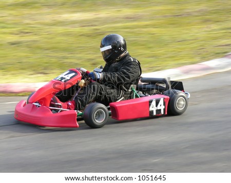 A racing red go kart.