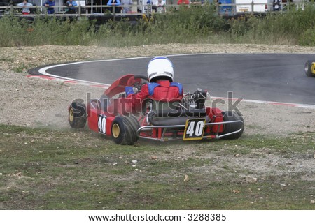 A go kart which has spun off the track
