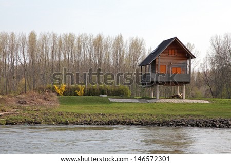 House on pylons near river Danube, Austria