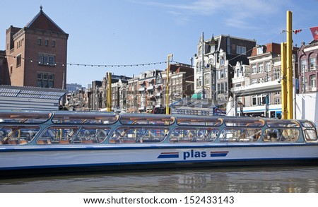 AMSTERDAM, NETHERLANDS - MARCH 26: Cruise ship for tourist on March 26, 2013 in Amsterdam