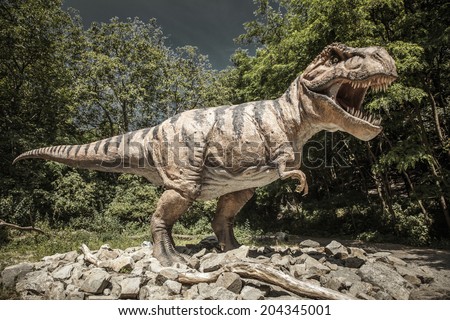 BRATISLAVA, SLOVAKIA - JUN 28: Realistic model of dinosaur Tyrannosaurus Rex at Dinopark on Jun 28, 2014 in Bratislava