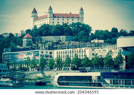 BRATISLAVA, SLOVAKIA - JUN 28: Bratislava castle from river Danube on Jun 28, 2014 in Bratislava