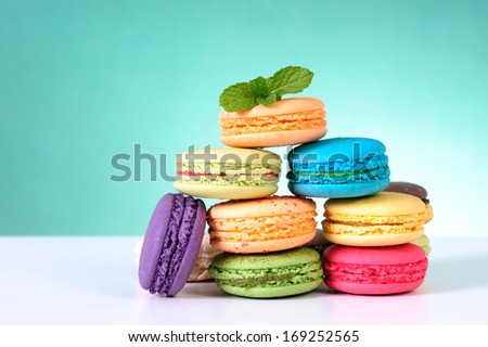 Macaroons, delicious French pastries, are made of two egg white, almond, and sugar cookies sandwiching a cream, ganache, or fruit-based filling.