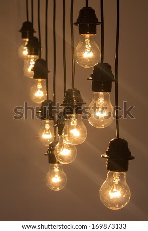 light bulbs hanging from the ceiling warm light