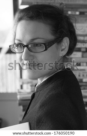 black and white portrait girl in glasses like teacher