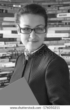 black and white portrait young woman in glasses like teacher