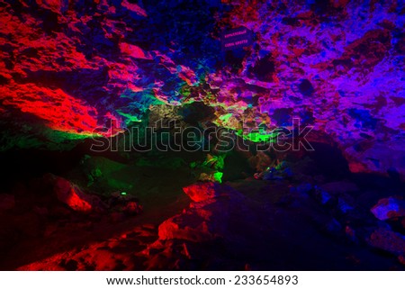 Kungur, Russia - November 25, 2014. Kungur Ice Cave. Colorful lighting cave wall in the cave coral