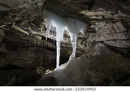 Kungur, Russia - November 25, 2014. Kungur Ice Cave. ice stalagmite in the cave