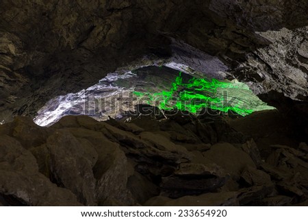 Kungur, Russia - November 25, 2014. Kungur Ice Cave. Green light in the cave wall