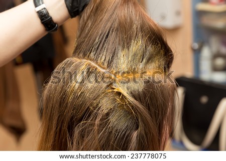 dyeing hair roots in part in red color