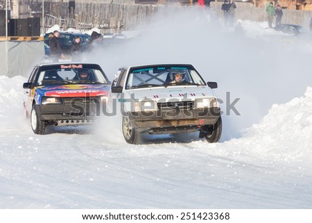 Dobryanka, Russia - February 7, 2015. Urban ice race. Contact the race on snow sports track near snowdrift