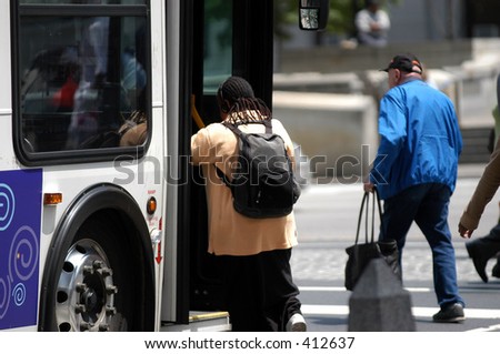 Woman getting on the bus