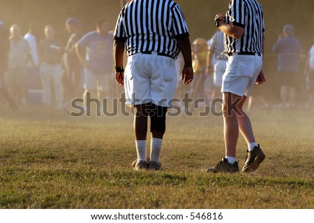 Referees on top of the action