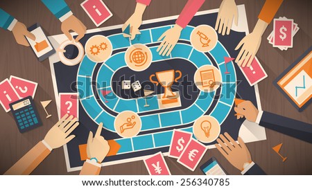 Business people playing together with a board game with business concept, strategy and competition concept