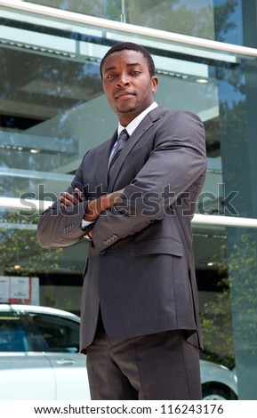Portrait of an confident african business man crossing his arms