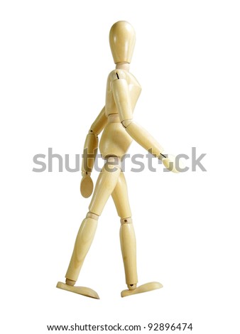 Walking wood puppet isolated over white background