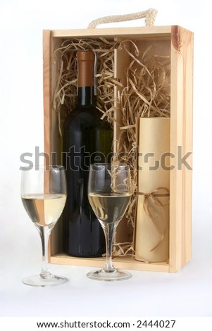 A bottle of wine in wooden box and two glasses of wine
