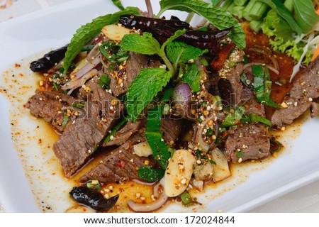 Thai food name is Grilled beef with spicy salad