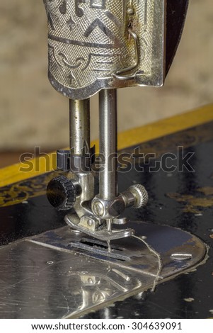 Mechanical unit of the sewing machine needle and thread.
