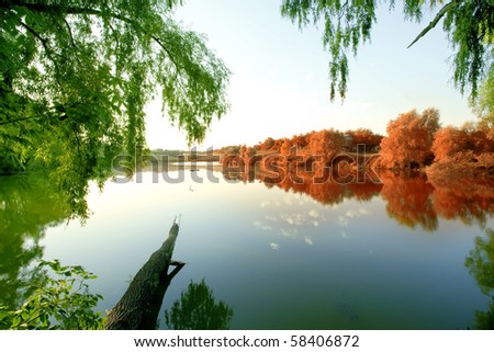 meeting of summer and autumn on the river
