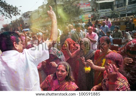 DELHI, INDIA - MARCH 08: People covered in paint on Holi festival, March 08, 2012, Delhi, India. Holi, the festival of colors, marks the arrival of spring, being one of the biggest festivals in India