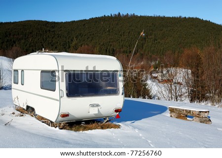Caravan on a snowy mountain
