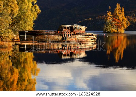 Wreck boat on the shore of Lochness, Scotland, Europe