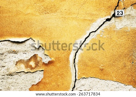 Crack in the house in ruins - wall of house destroyed during earthquake