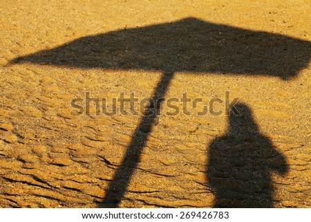 Shadow of a beach umbrella