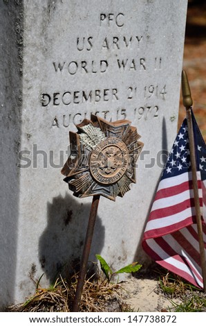 World War II Veteran\'s Resting Place Marked with American Flag