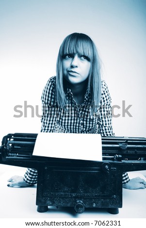 Business woman portrait in office with vintage typing machine